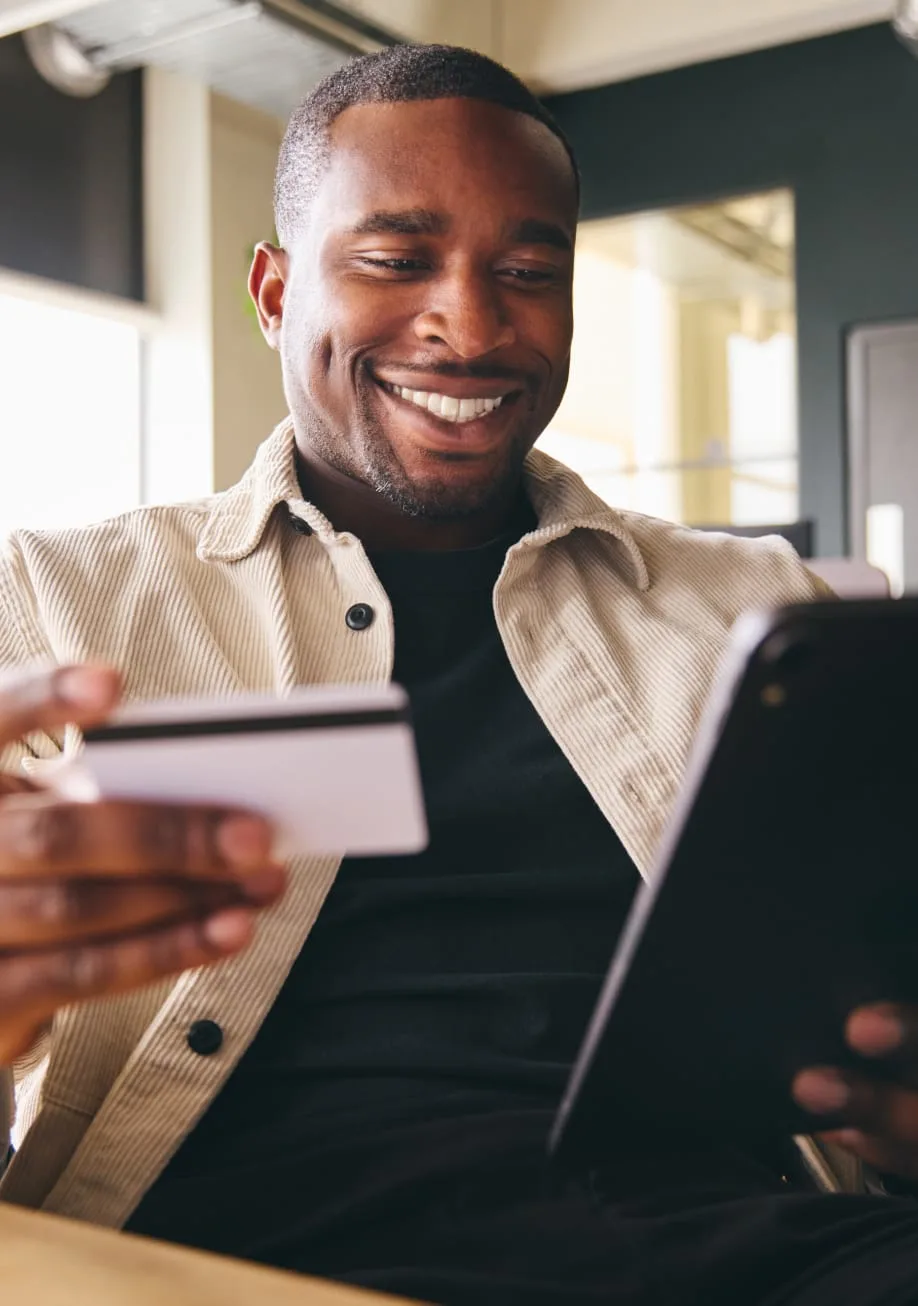 man holding credit card